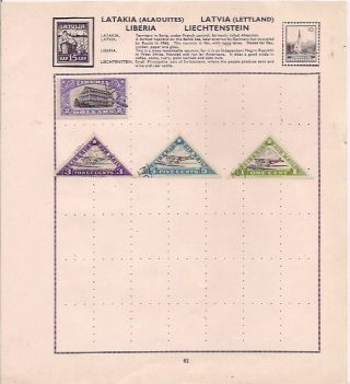 4 Liberia Stamps On An Album Page.