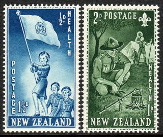 Zealand B42 - B43, .  Girl Guides Marching; Boy Scouts At Camp,  1953