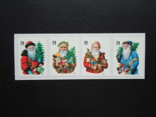 2001 Four Santas - Cat 3537b - 3539b,  3540e Four Single 34 Cent Stamps Mnh