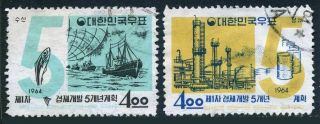 Korea South 404 - 405, .  Michel 436 - 437.  5 - Year Plan.  1964.  Oil Refinery,  Fishing.