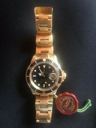 Men ' s Rolex Submariner Black 18K yellow gold watch 4