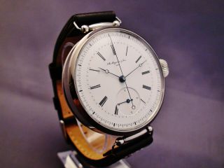 A.  Huguenin & Sons,  Locle.  Two - Train,  Jumping 1/4 Seconds.  Chronograph Watch.