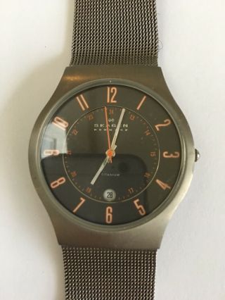 Skagen 233xlttmo Men’s Ultra Slim Titanium Watch Dark Grey Dial,  Orange Digits