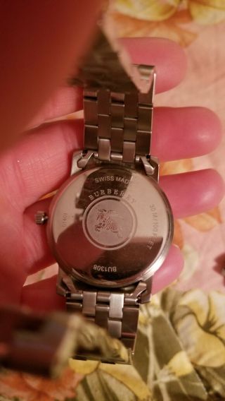 Burberry watch men silver plaid face has all the links great 4
