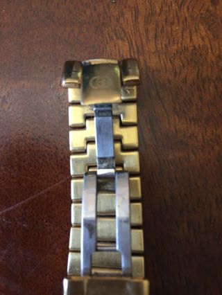Pre - owned Gucci men ' s watch gold 3300.  2.  m with gold plated belt and dial. 3