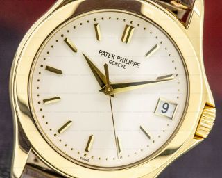Patek Philippe 5107J - 001 Calatrava Automatic 18K Yellow Gold AND PAPERS 2