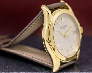 Patek Philippe 5107J - 001 Calatrava Automatic 18K Yellow Gold AND PAPERS 3