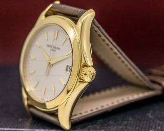 Patek Philippe 5107J - 001 Calatrava Automatic 18K Yellow Gold AND PAPERS 4