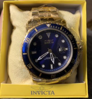 Invicta Pro Diver 15352 Mens Watch.  Gold Band,  Blue Face.