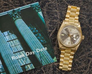 Rolex President Day - Date,  Ref no 1807,  18K Yellow Gold,  Silver Dial,  Bark Bezel 12