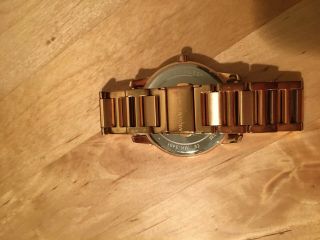 Michael Kors Women ' s Gold Toned Mid - size Watch 1.  5 inch Diameter 4