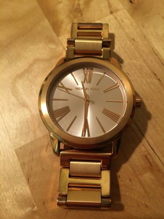 Michael Kors Women ' s Gold Toned Mid - size Watch 1.  5 inch Diameter 5