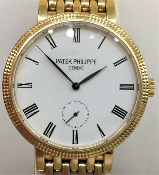Midsize Patek Philippe Calatrava 18k Yellow Gold Watch on a Bracelet Ref 7119/1J 2