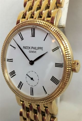 Midsize Patek Philippe Calatrava 18k Yellow Gold Watch on a Bracelet Ref 7119/1J 4