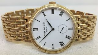 Midsize Patek Philippe Calatrava 18k Yellow Gold Watch on a Bracelet Ref 7119/1J 5