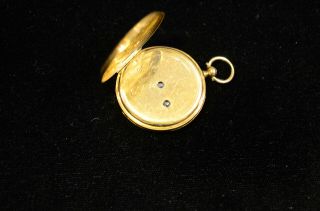18k gold,  enamel,  with tiny diamonds.  rare by B.  Haas Jne.  pendant watch 10