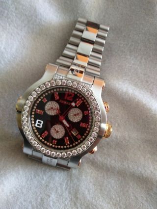 RENATO MENS DIAMOND AND RUBY WRIST WATCH.  WILD BEAST STEEL AND MOTHER OF PEARL. 7