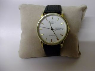 Rotary Mens Vintage Gold Plated Slimline Quartz Watch Day Date With Black Strap
