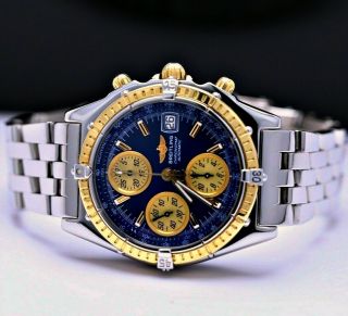 Breitling Chronomat Gt 18k Gold Bezel & Ss Blue Dial - D13050.  1 Ln