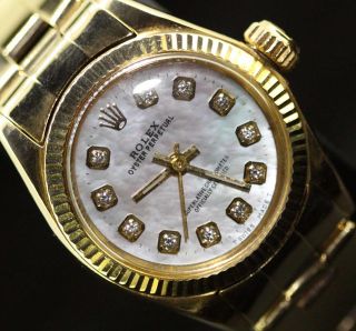 Rolex Ladies Oyster Perpetual 14k Gold Diamond Dial Pearl Oyster
