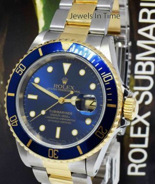 1999 Rolex Submariner blue watch 16613 18K yellow gold steel,  box papers 40 MM 2