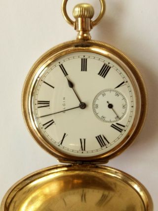 Antique pocket watch.  Elgin 1911.  Full hunter gold plated case.  well. 4