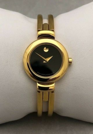 Look Authentic Movado Museum Ladies Gold Tone Bangle Wristwatch 88.  A1.  809a