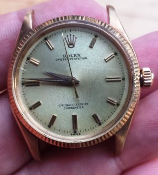 Rolex 14k Gold Oyster Perpetual 6567 Champagne Dial 34mm 1030 Caliber Movement