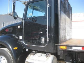 2007 PETERBILT 335 C7 CAT 10 SPEED TANDEM AXLE WITH 24 ' FLATBED SET UP FOR MOFFITT FORKLIFT 10