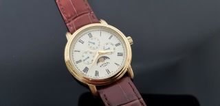 Rotary Triple Date Moon Phase Gold Plated Gents Watch On Strap.  Ex Display Model