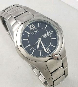 Mens Citizen Eco Drive Titanium Wrist Watch Wr 100