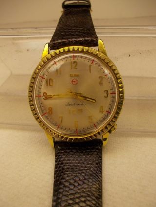 Vintage.  Elgin.  " 150 ".  Electric,  Swiss Made.  Quartz Watch,  Gold Toned Bezel