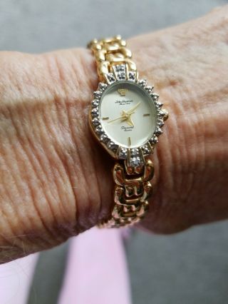 Vintage Ladies Jules Jurgensen Gold Tone Quartz Diamond Accent Watch.