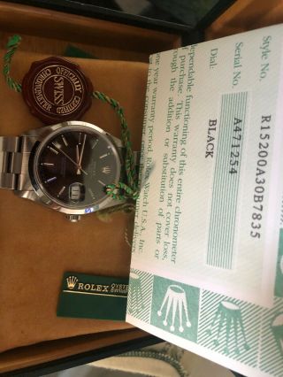 Rolex Oyster Perpetual Stainless Steel Black Face Date