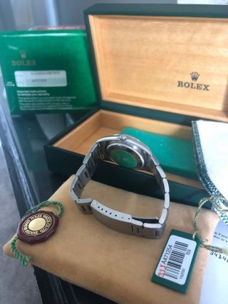 Rolex Oyster Perpetual Stainless Steel Black Face Date 4