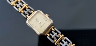 Verity Swiss Made Two Tone Ladies Bracelet Watch With Champagne Dial.
