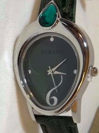 Ladies Watch In Green And Silver With An Accent Stone And Green Band