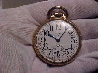 16s,  17j,  Open Face,  Elgin Pocket Watch,  Model 573 In 10k Rolled Gold Fille Case