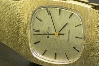 Omega vintage 14K gold high fashion automatic men ' s watch w/ bark texture dial 2