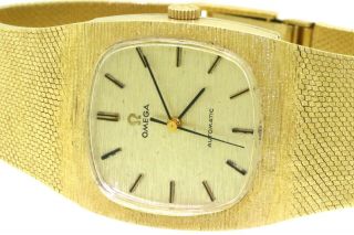 Omega vintage 14K gold high fashion automatic men ' s watch w/ bark texture dial 4