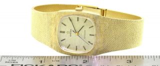 Omega vintage 14K gold high fashion automatic men ' s watch w/ bark texture dial 5