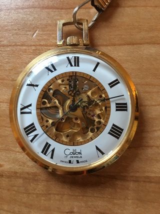 Colibri 17 Jewel Skeleton Gold Tone Closed Case Pocket Watch And Chain