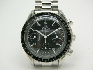 Omega Speedmaster Automatic Ref: 3510.  50 book & Papers. 2