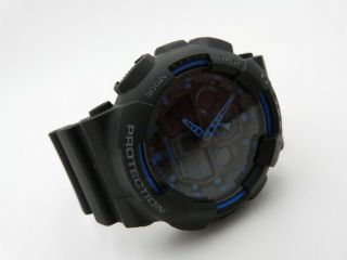Casio G - Shock Men ' s Black/Blue Digital/Analog Watch - Model GA - 100 4