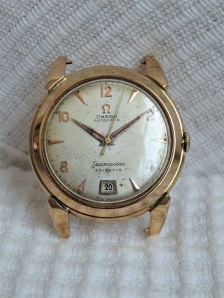 Vintage Omega Seamaster automatic ' bumper ' watch,  18k solid gold,  353,  patina,  runs 4