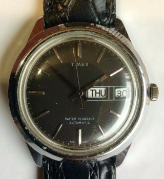Timex,  17 Jewels,  Automatic,  Water Resistant,  Date / Day Indicator,  Swiss Watch