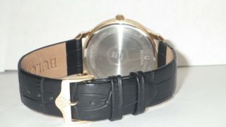 Bulova Men ' s 97A123 Gold Tone Stainless Steel Dress Watch w/ Black Leather Band 8