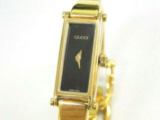Gucci Ladies Wrist Bangle Watch 1500 Black Dial Gold Tone Quartz 16160078000 G