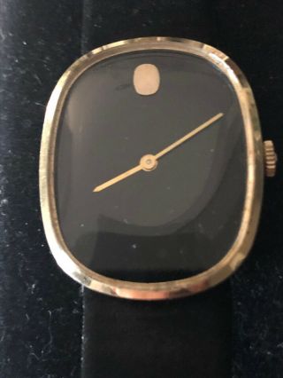 Mens Classic Yellow Gold Oval Movado Museum Black Leather Strap Dial Watch