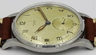 V.  Rare Vintage military stainless steel Universal Geneve cal.  262 radium dial 7